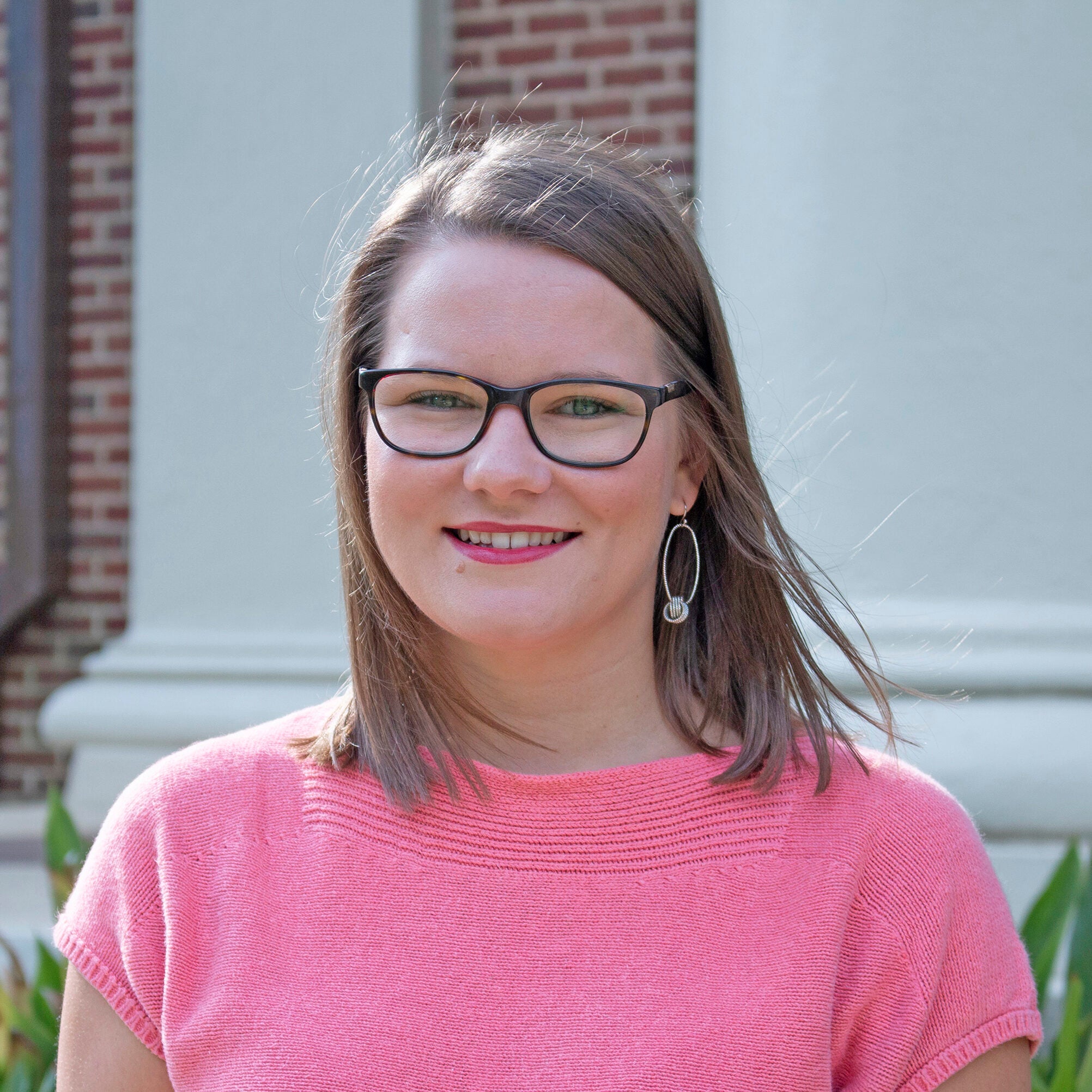 A female university student poses for a photo