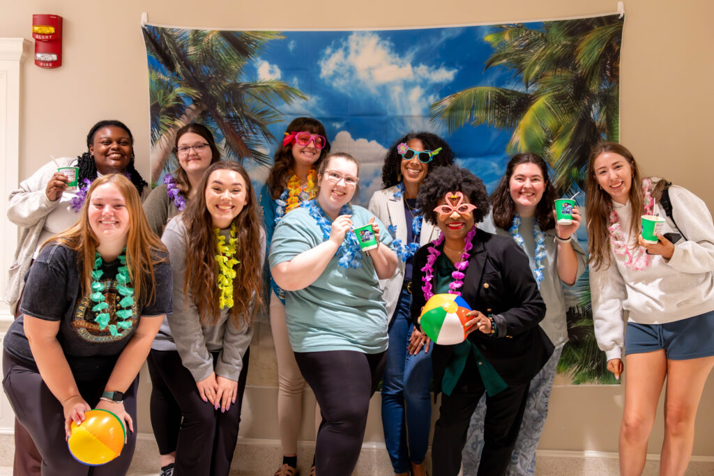 Students and faculty at the Spring Luau in Little Hall 2024