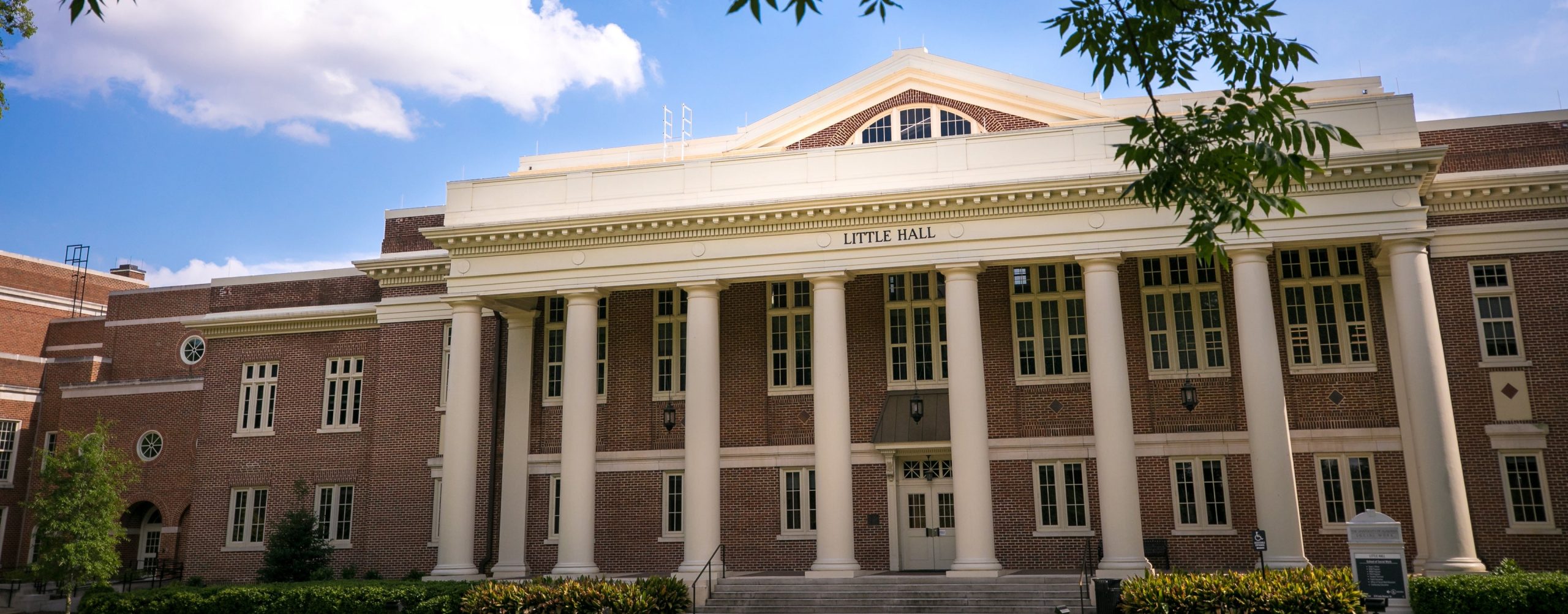 A campus building in sunshine.