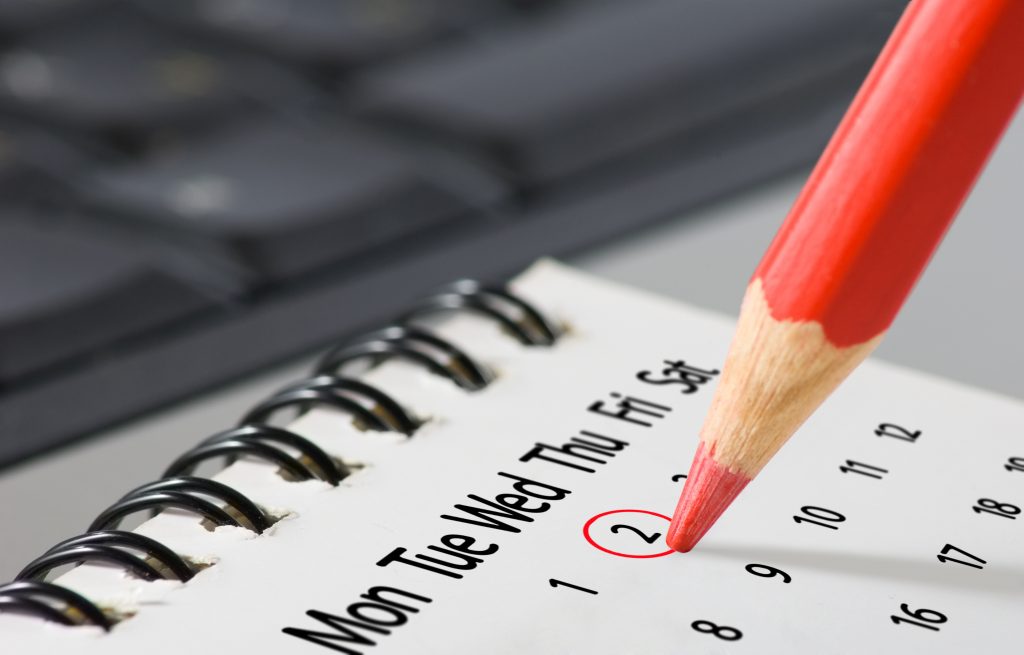 image of calendar and pencil close up